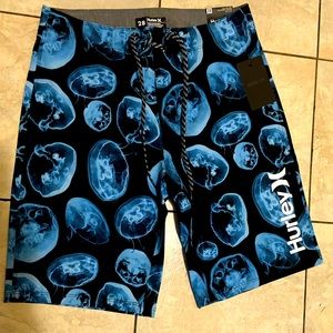 Hurley men’s size 28 20” board shorts with blue jellyfish pattern